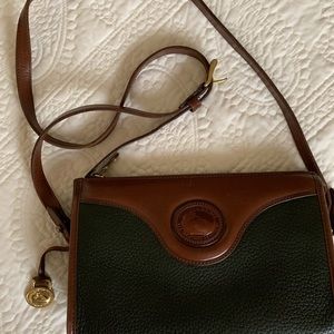 Authentic Dooney & Bourke. Green leather & brown.